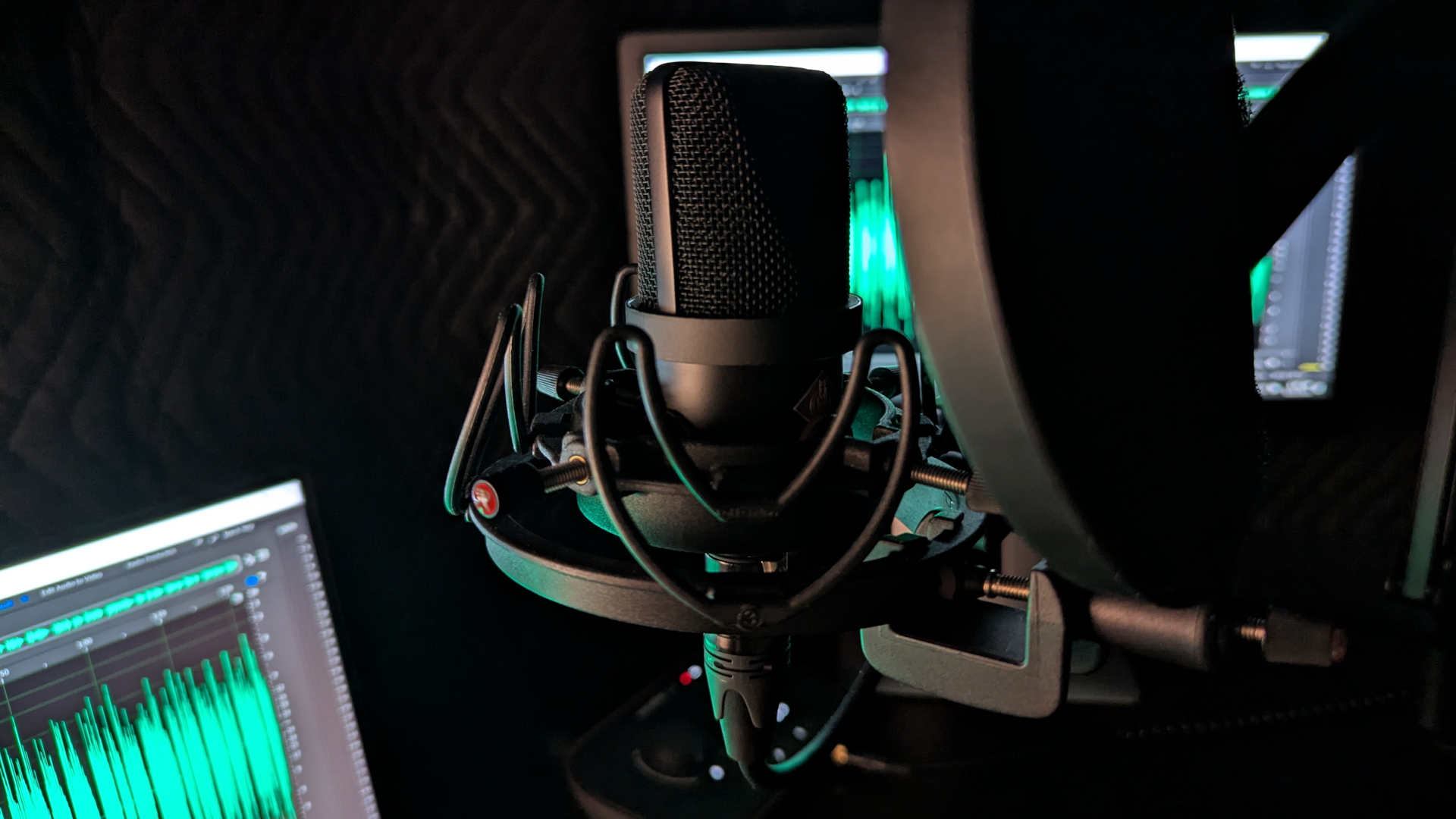Photo of a Neumann TLM 102 microphone in Will Profitt’s recording studio